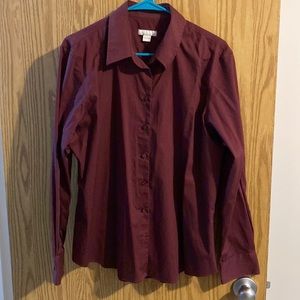 Maroon coloured dress shirt.